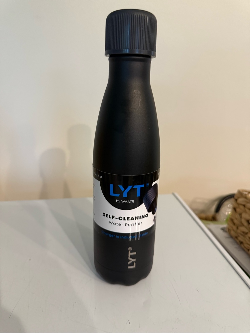 NEW WAATR LYT self-cleaning water purifier bottle in black. 17oz